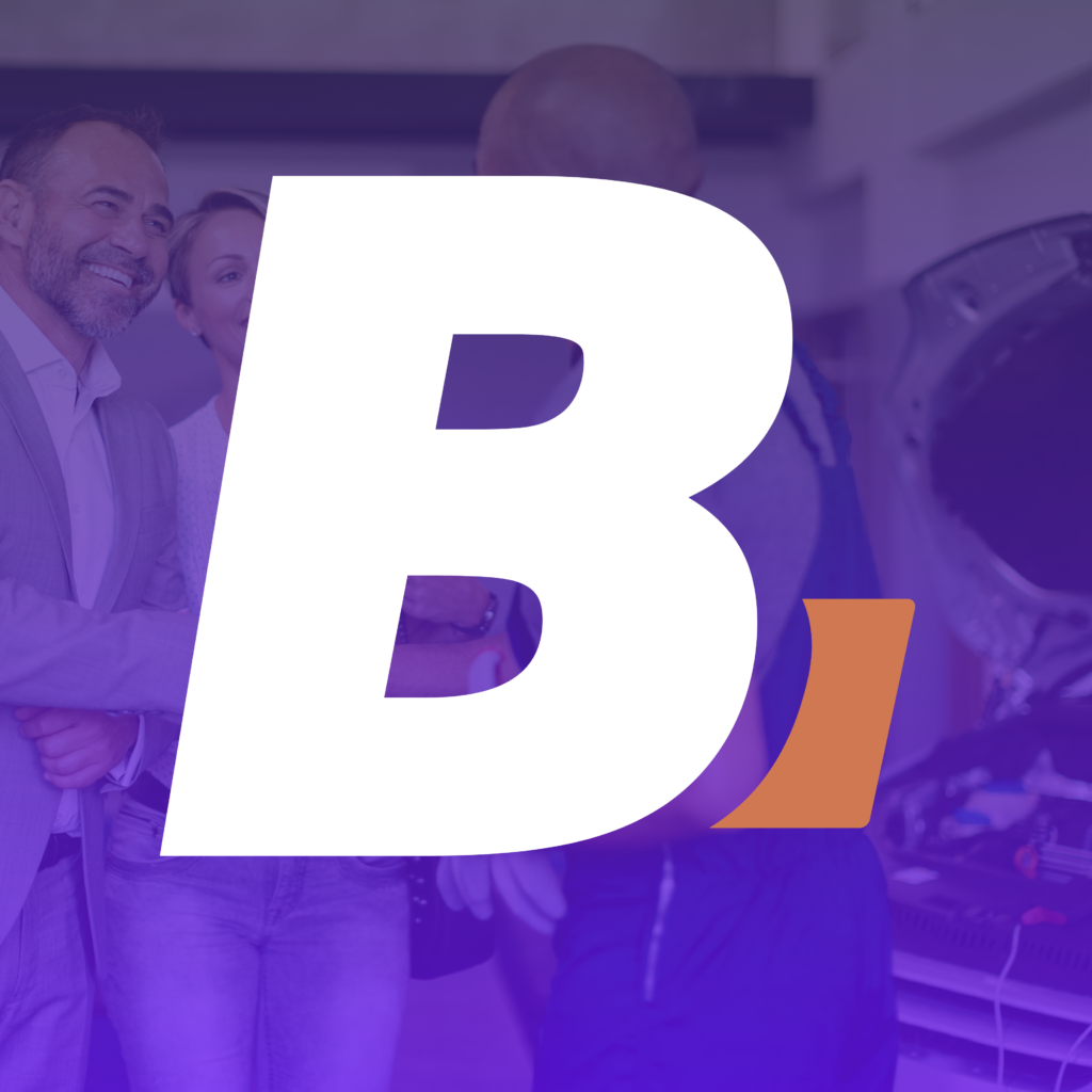 Smiling professionals posing together in a workspace, with a large white graphic overlay in the foreground.